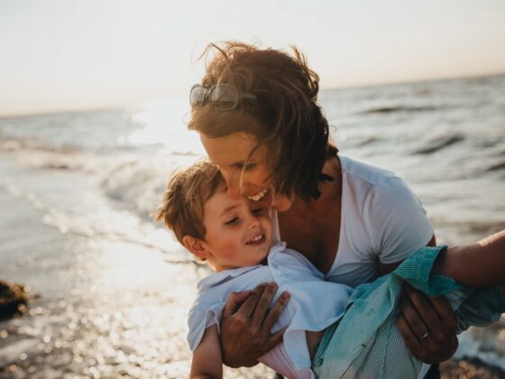 Mothers day celebration with mom and son on beach